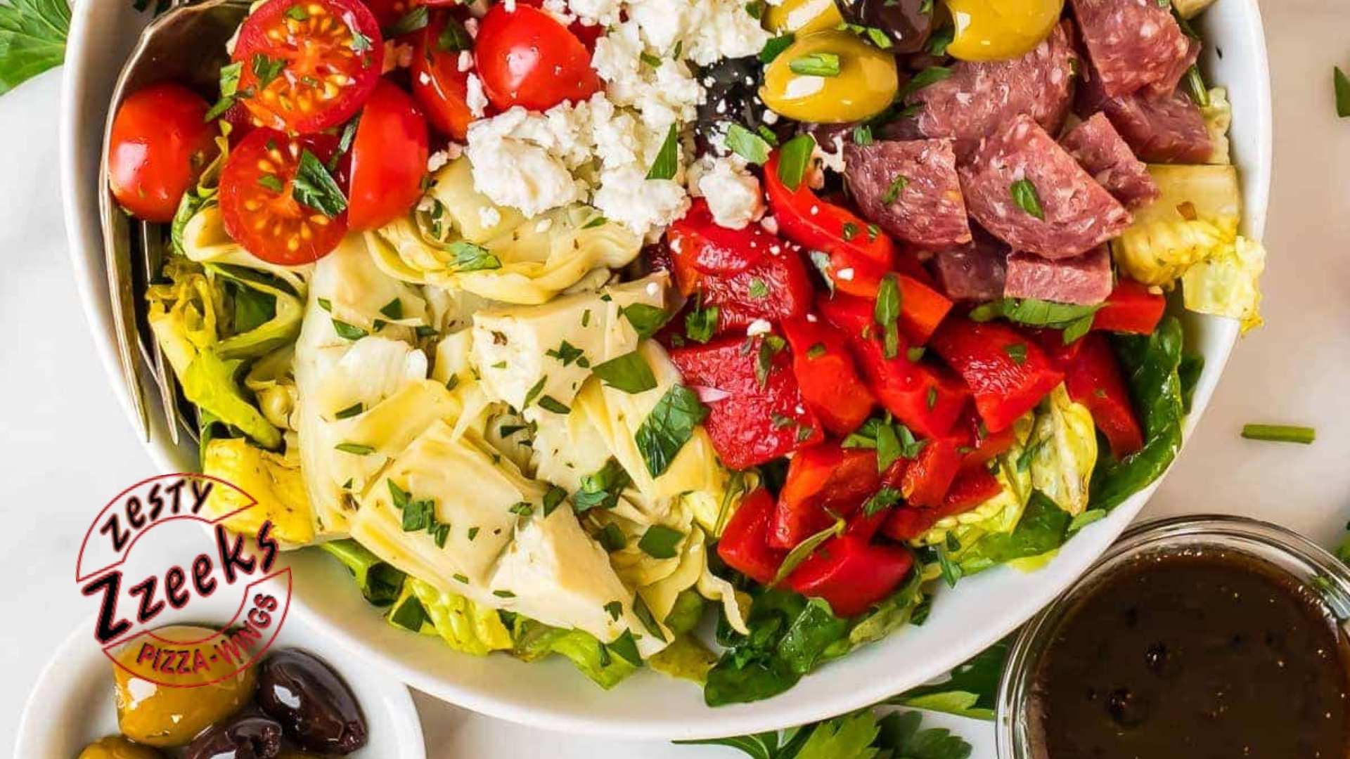 Zesty Zzeeks Pizza - Blog - Fresh and Flavorful Zzeeks’ Salads - Antipasto Salad
