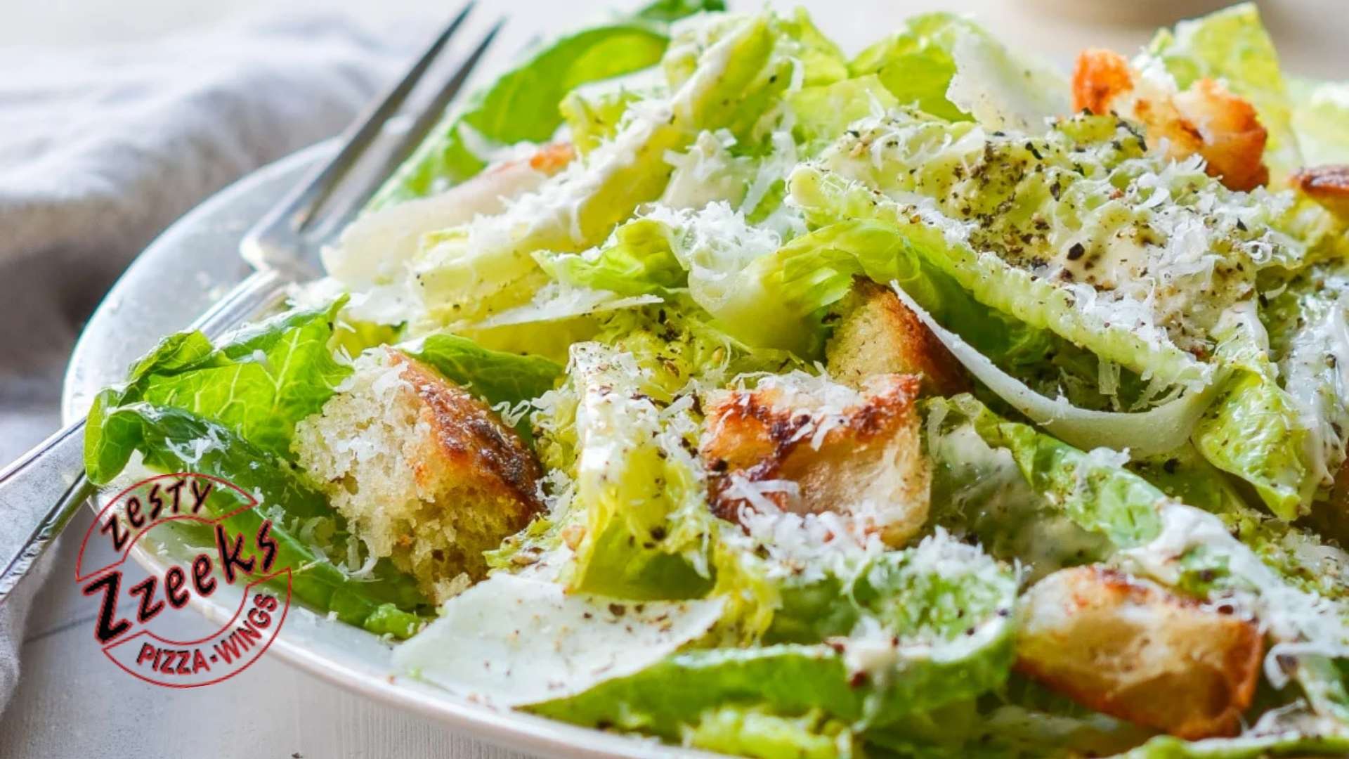 Zesty Zzeeks Pizza - Blog - Fresh and Flavorful Zzeeks’ Salads - Caesar Salad